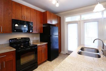 Stainless Steel Sink With Faucet In Kitchen at The Villagio Apartments, Fayetteville